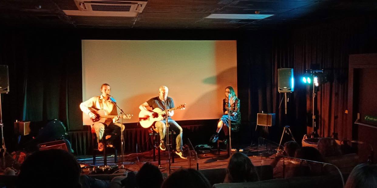 Ryan Edwards performing live as part of a trio